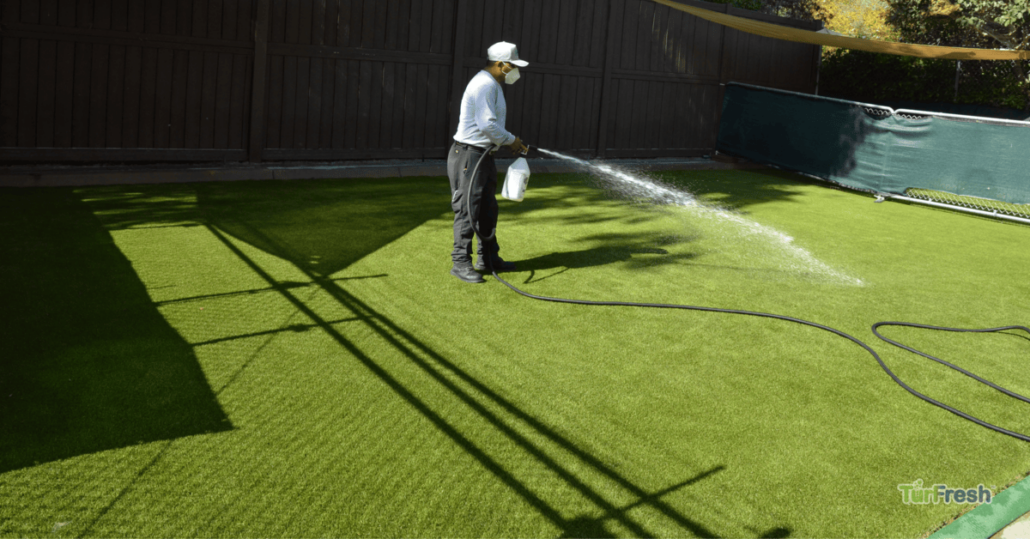Outdoor surface, and artificial turf
