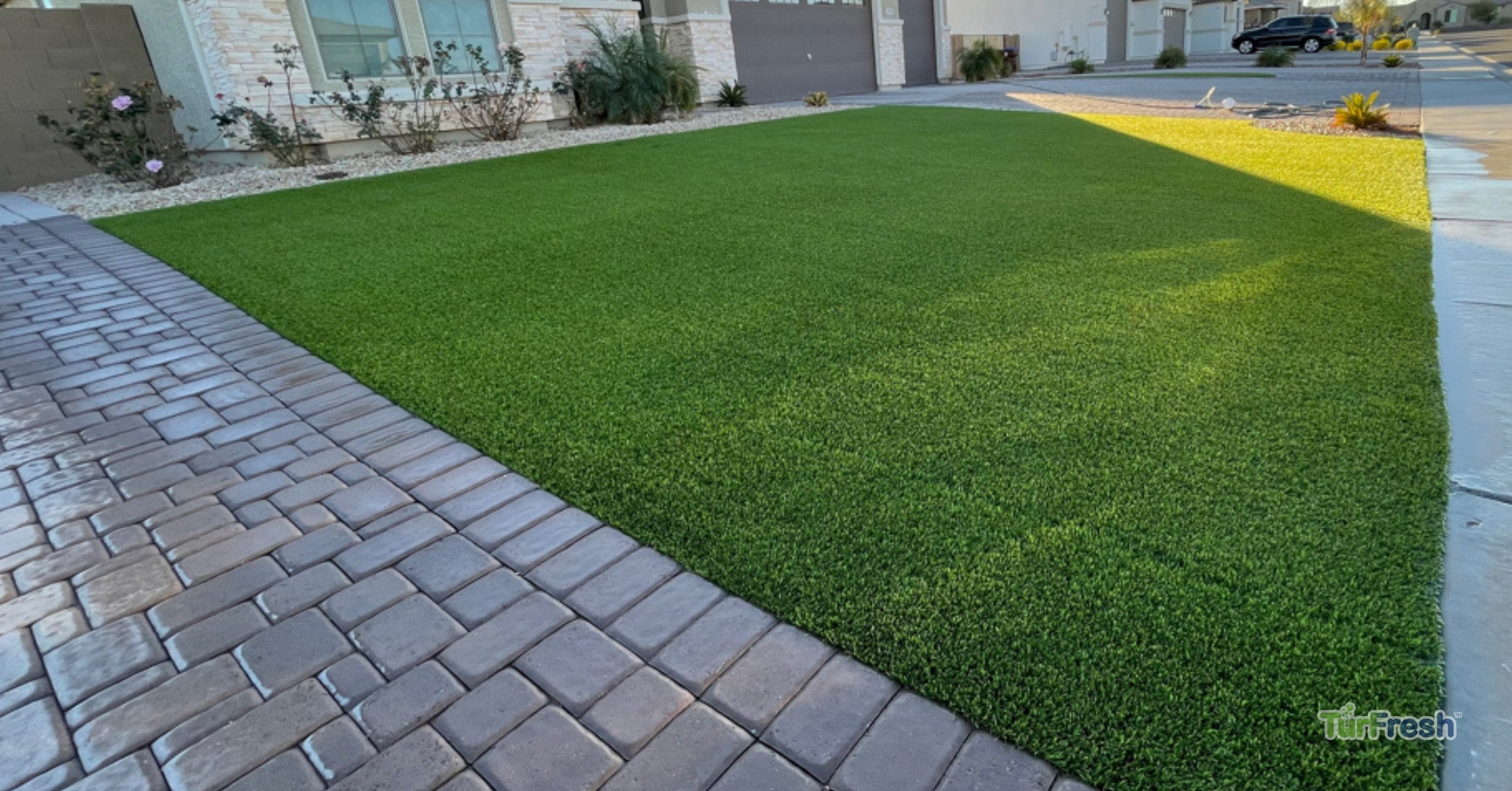 TurFresh Professional Artificial Turf Cleaning and Restoration for Residential Lawns Freshly cleaned artificial turf lawn restored by TurFresh in a residential front yard