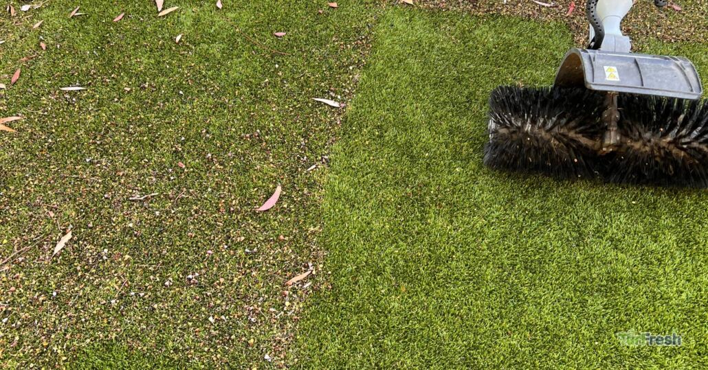 Artificial turf covered in debris on the left side, with freshly cleaned turf on the right after TurFresh grooming.