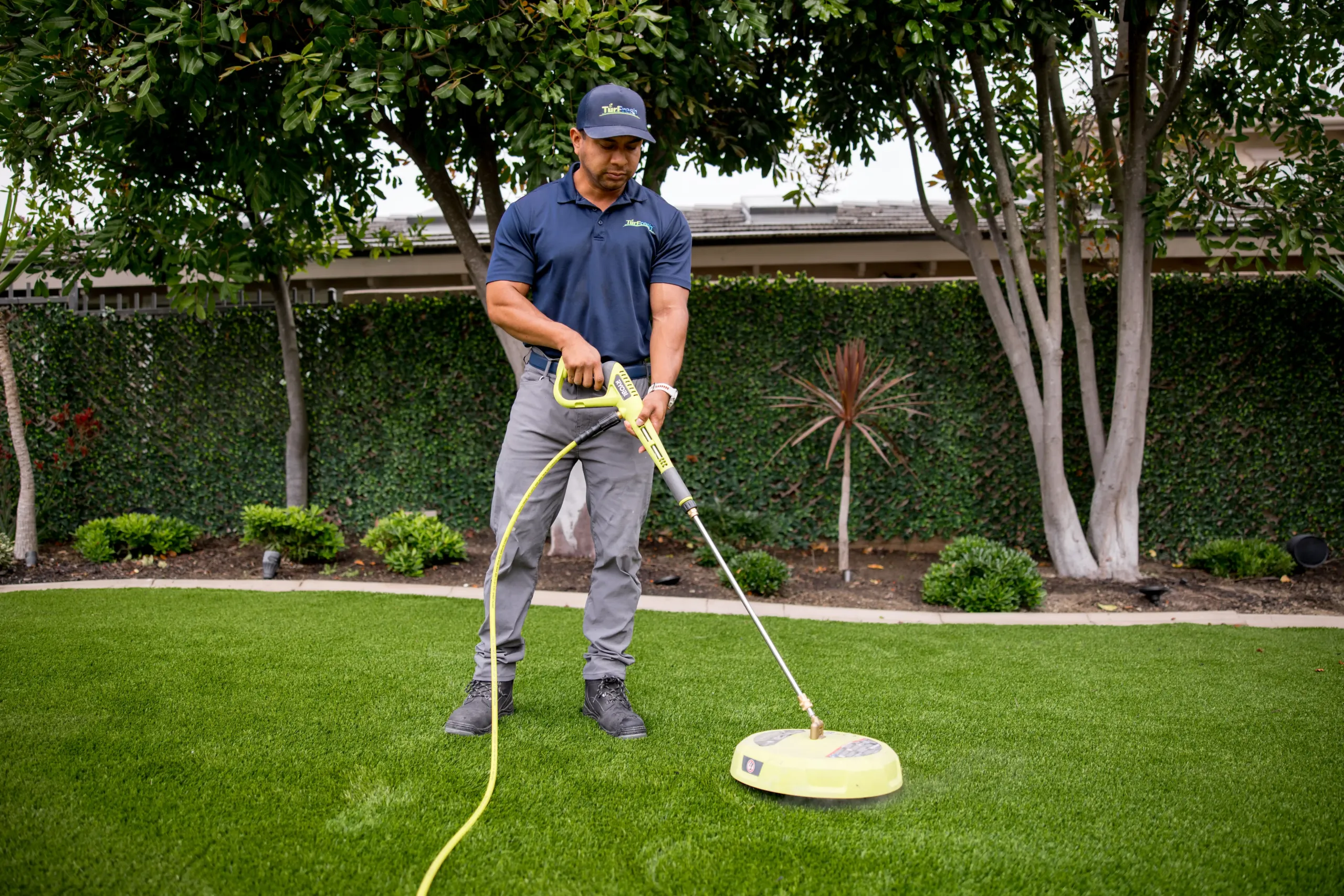 Deep Artificial Turf Cleaning & Maintenance Service Team performing artificial turf deep-clean and maintenance service