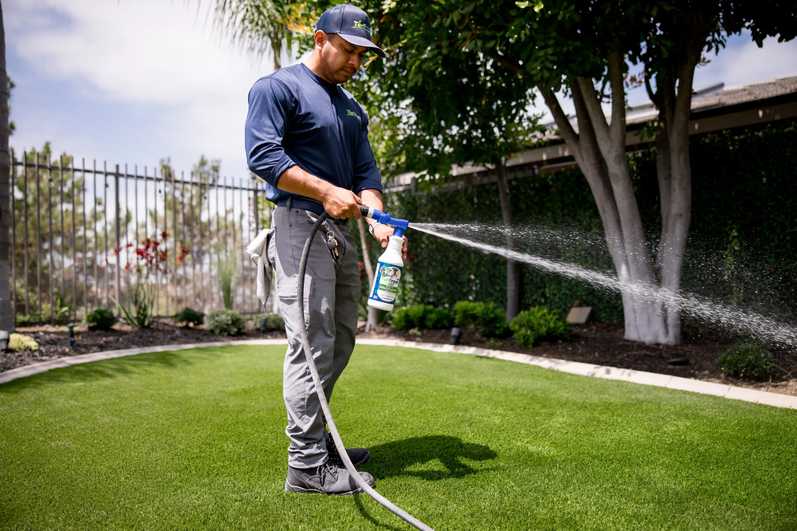 Artificial Turf De-compaction Maintenance Service Technician de-compacting synthetic turf blades for maintenance
